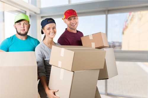 Removal van and moving team in Richmond upon Thames street