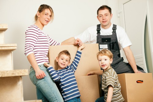 Workers unloading moving boxes for a Richmond upon Thames removal company
