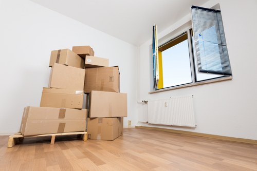 Careful packing of household items for a local move